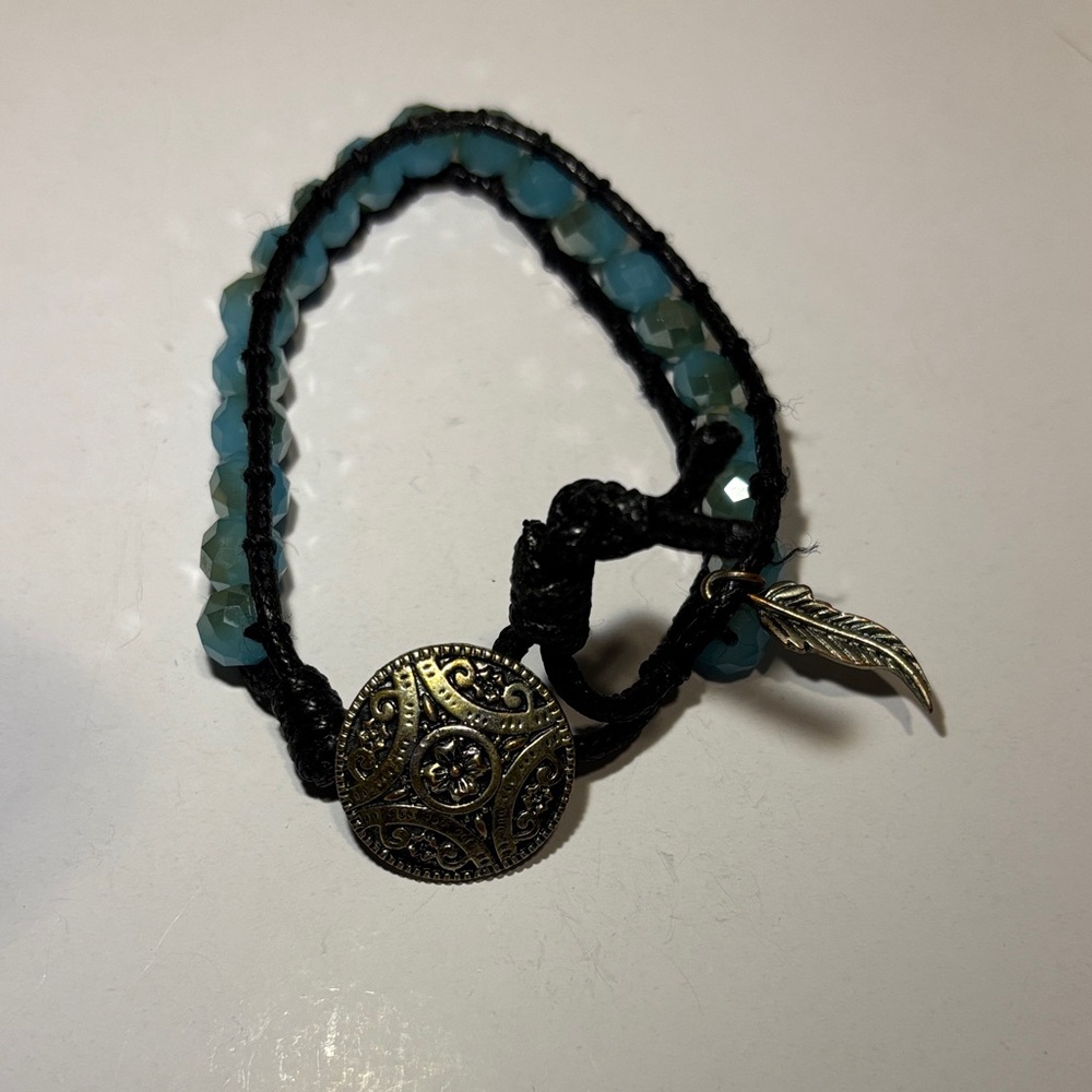 Elegant Beaded Bracelet with Leaf Charm